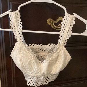 New w/ tags AERO Brawlette - off white - size small.